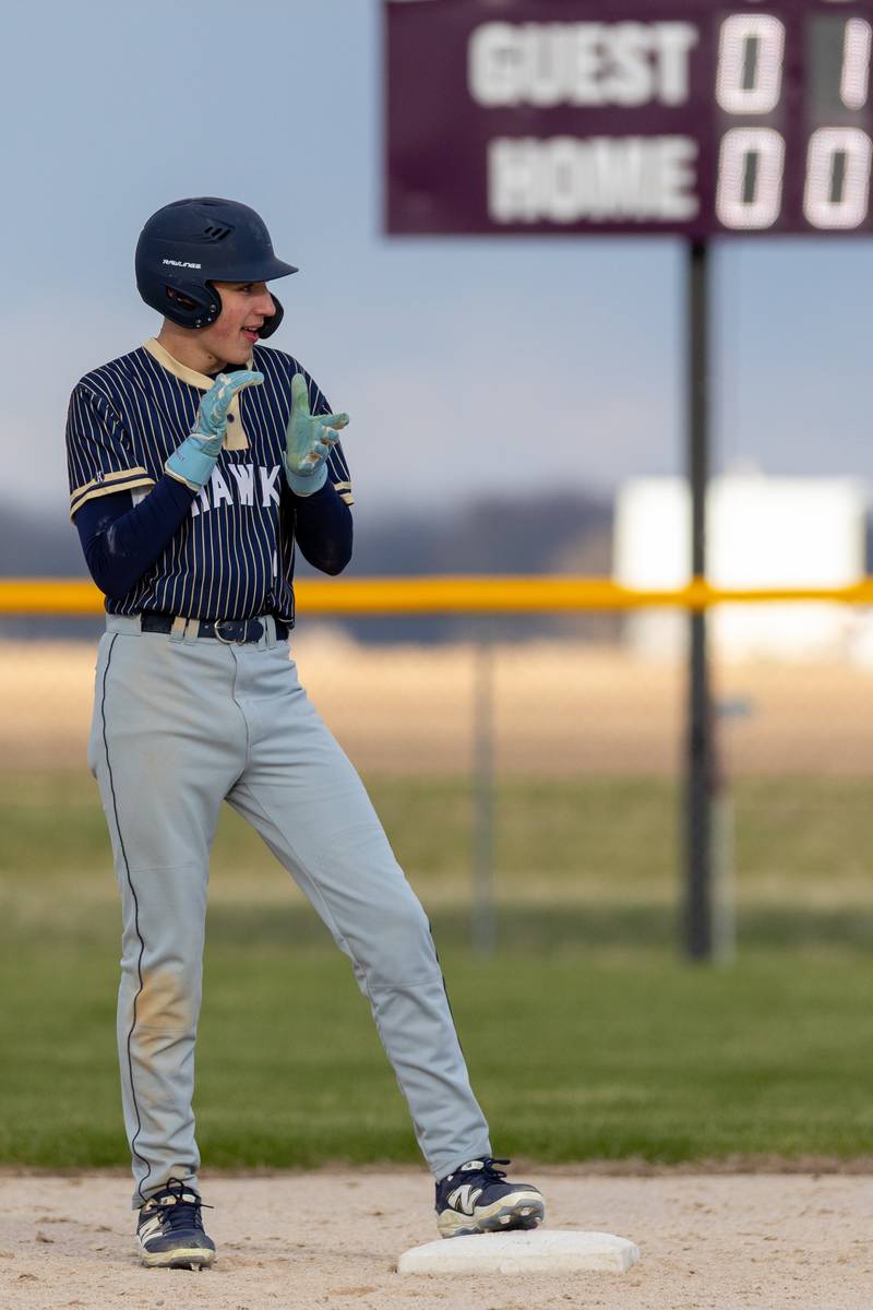Colby Wylde of Hiawatha claps after making it to second base on Monday, April 7, 2025 at Serena High School in Serena.