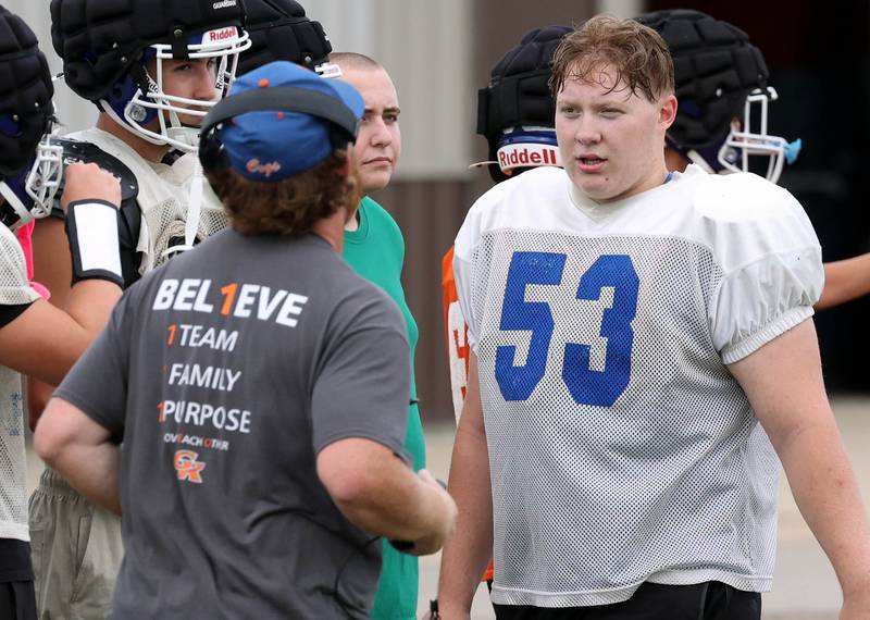 Genoa-Kingston’s Mason McPeek takes a break between drills Tuesday, Aug. 19, 2025, during practice at the school.