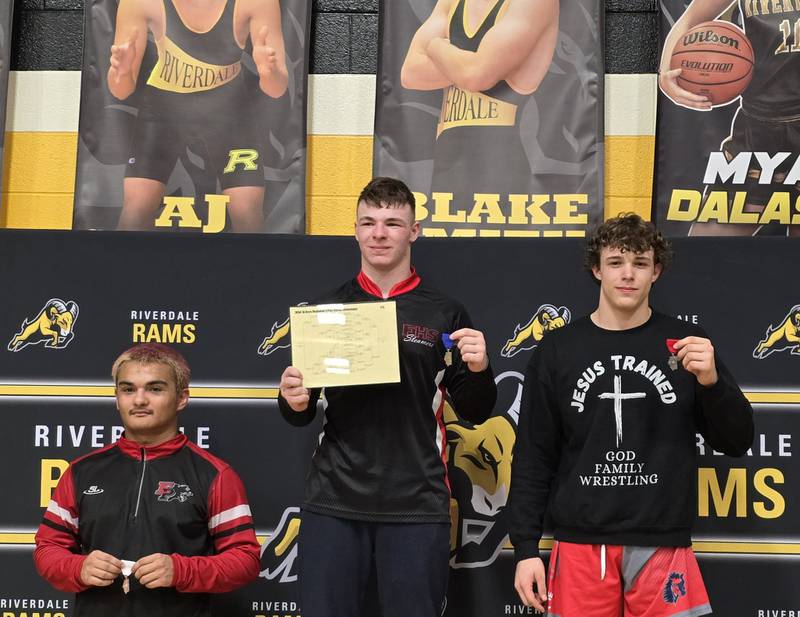 Fulton's Skylier Crooks, center, is pictured after winning the Class 1A Riverdale Regional title at 175 pounds on Saturday, Feb. 8, 2025. Morrison's Noah Stout, right, took second and E-P's Jordae Crow was third.