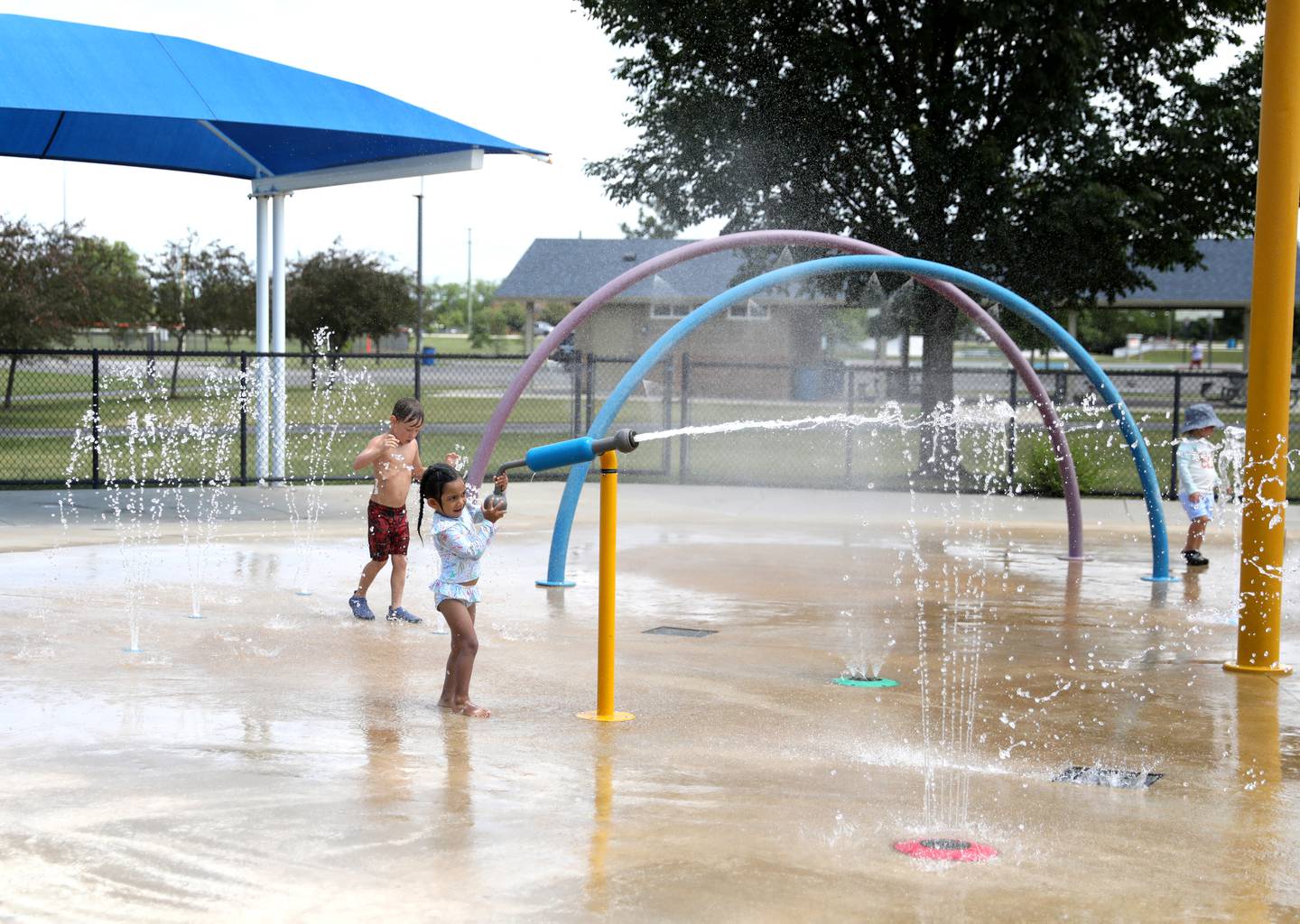 Kids stay cool at the Oswegoland Park District's Prairie Point Splash Pad on Wednesday, June 25, 2025 in Oswego.