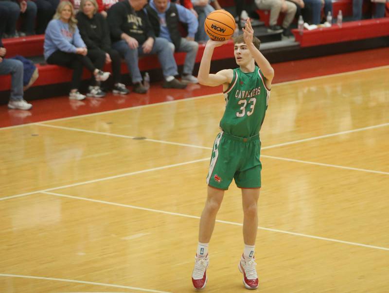 L-P's Gavin Stokes shoots a wide-open three-point basket against Ottawa on Friday, Feb. 6, 2026 in Kingman Gymnasium at Ottawa High School.