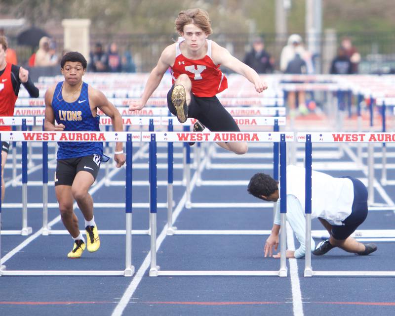 Lyons Anthony Pearson and Yorkville's Quin Campbell head for the last hurdle in the 110 Meter Hurdles at the Peterson Prep Invitational by Kaneland on Saturday, April 20,2024 at West Aurora High School in Aurora.