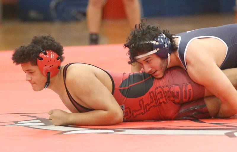 Streator's Noah Pryor wrestles Lisle's Bequer Zamarripa during a meet on Wednesday, Jan. 21, 2025 in Pops Dale Gymnasium at Streator High School.