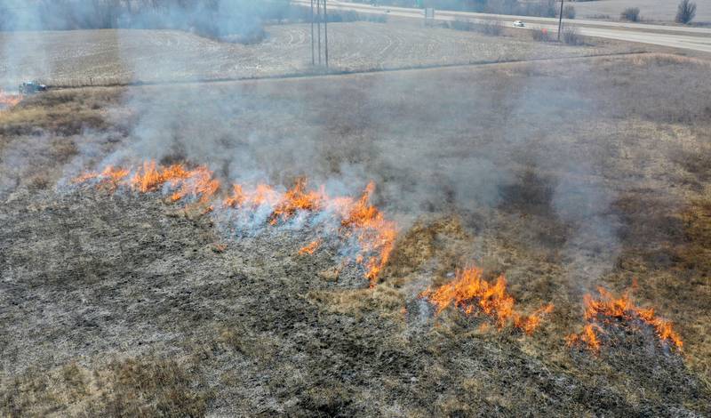 Crews from Semper FI Land Servces. along with the help from the Illinois Department of Transportation, conduct a controlled burn at Deer Pit Prairie near the intersection of Interstate 39 and Illinois Route 251 on Monday, Feb. 10, 2025 near Oglesby. The burns are designed to clear out invasive plants and encourage the growth of native prairie vegetation. Other locations that IDOT has another scheduled future burns are Indian Boundary Prairie near Ohio in Bureau County.