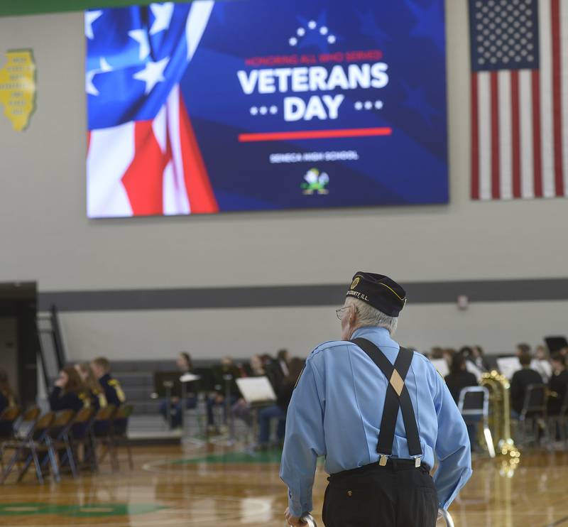 Veterans walked toward their seats prior to the Veterans Day ceremony at Seneca High School Monday. The event was sponsored and led by The Seneca FFA.