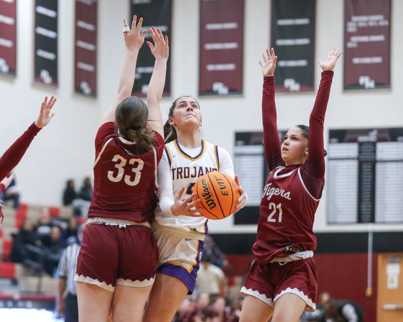 Downers Grove North's Campbell Thulin (5) puts up a shot during their Regional Final basketball game between Downers Grove North at Plainfield North. Feb 20, 2025 in Plainfield.