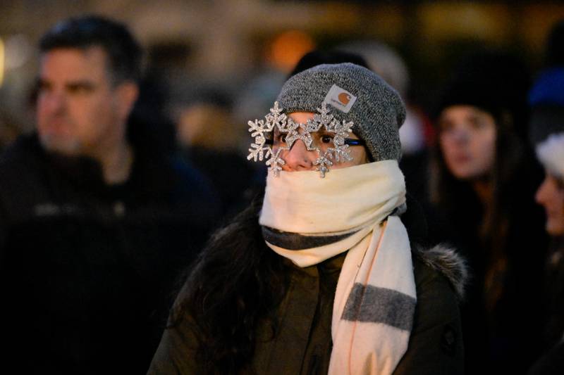 Ana Blancas wears snowflake glasses during the Lighting of the Lights Ceremony at 1st Street Plaza on Friday, Nov 28, 2025 in St. Charles.