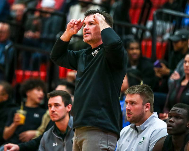 Glenbard West's head coach Jason Opoka looks on during their basketball game between Glenbard West at Hinsdale Central, Friday  Dec 6, 2024  in Hinsdale.