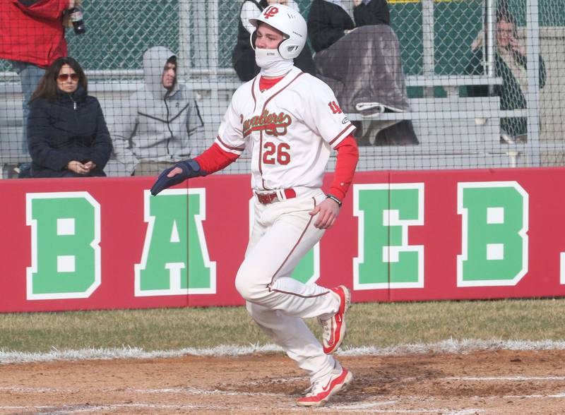 L-P's Griffin May scores a run against Mendota on Thursday, April 3, 2025 at Huby Sarver Field inside the L-P Athletic Complex in La Salle.