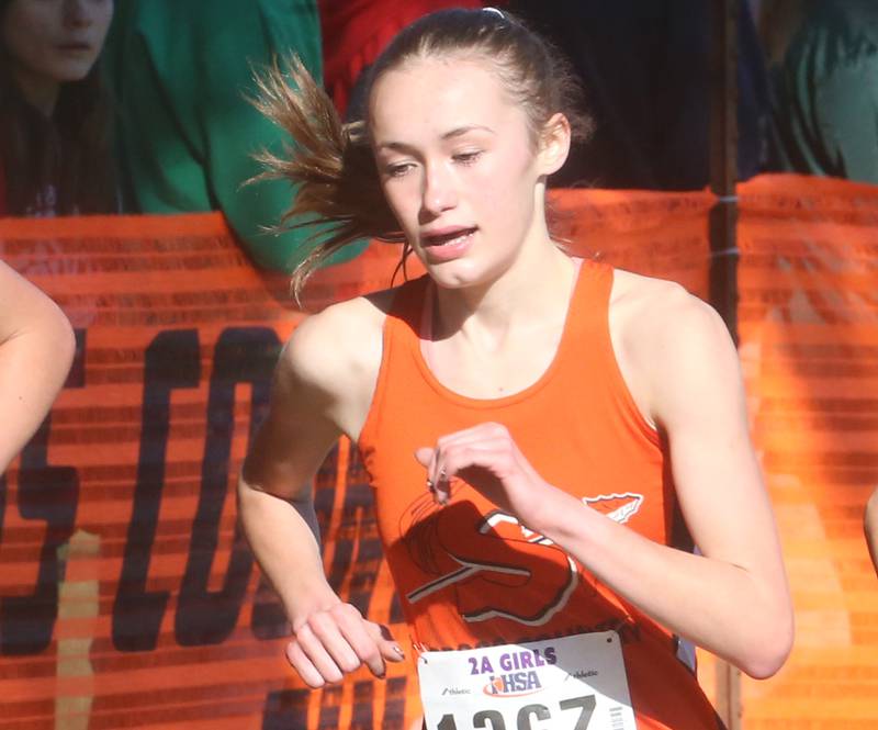 Sandwich's Sundara Weber (center) competes in the Class 2A State Cross Country race on Saturday, Nov. 4, 2023 at Detweiller Park in Peoria.