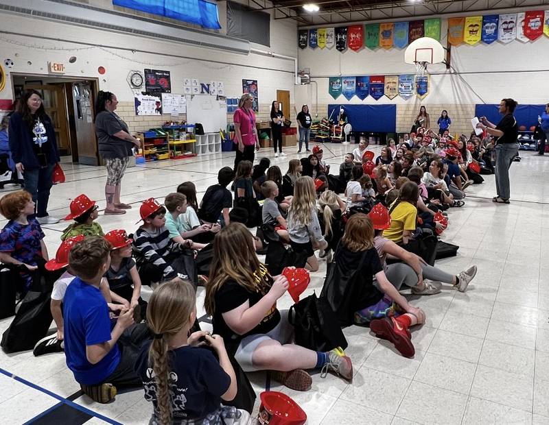 Newark Grade School participated in Camp 911 on May 9, a program begun in 2015 by retired Newark School District nurse Karen Sapsford. Firefighters and EMTs from the Newark Fire Department along with deputies from the Kendall County Sheriff's Office brought their equipment to show students, while nurses from Rush Copley Medical Center in Yorkville taught students first aid.