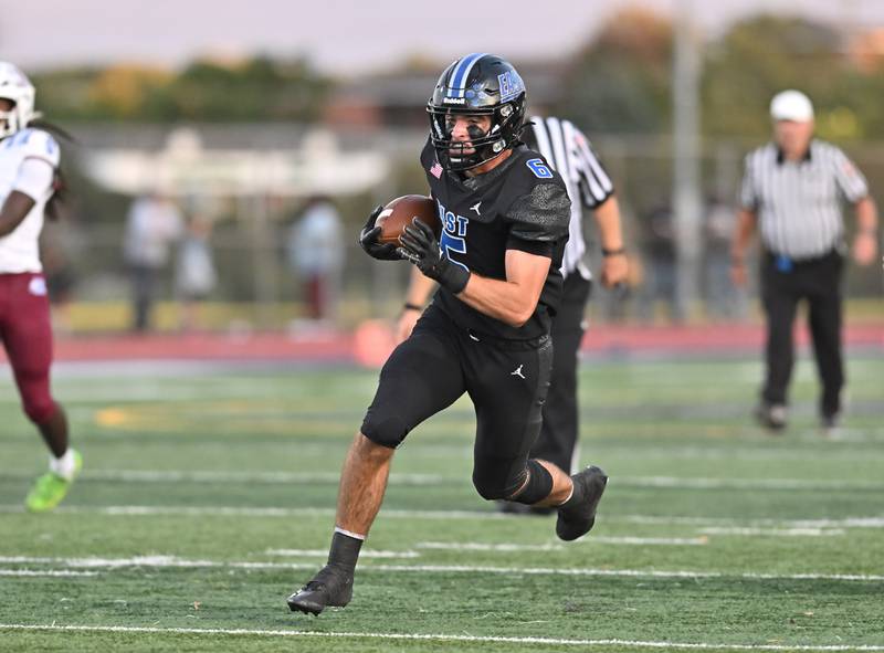 Lincoln Way East's William Schlinger (6) out runs the Kankakee defense for a touchdown during the non-conference game on Friday, Sept. 05, 2025, at Frankfort.
