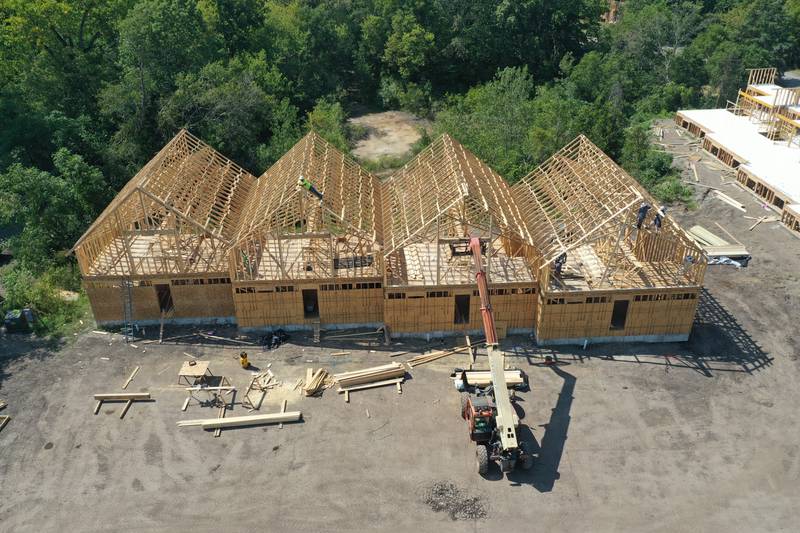 Workers build a new cabin unit on Monday, Aug. 28, 2023 at Grand Bear Resort at Starved Rock in Utica.