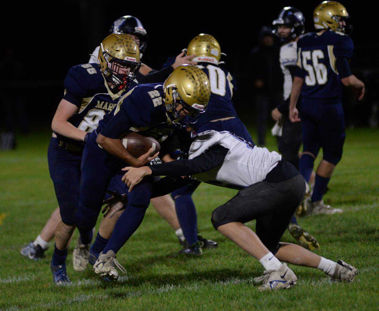 Polo's Delo Fernandez runs for a gain against West Prairie during 8-man football playoff action on Friday, Oct.27, 2023 at Polo High School.