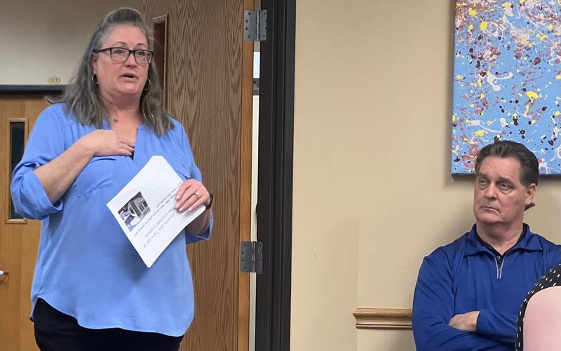 Sycamore High School Principal Tim Carlson looks on as Director of Life School Rhonda Graves talks during the May 9, 2023 Sycamore Community School District 427 Board of Educators meeting.