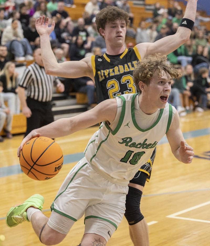 Rock Falls’ Kuitim Heald drives to the hoop against Riverdale’s Jacob Watson Friday, Feb. 28, 2025, during the Class 2A Regional final at Bureau Valley High School.