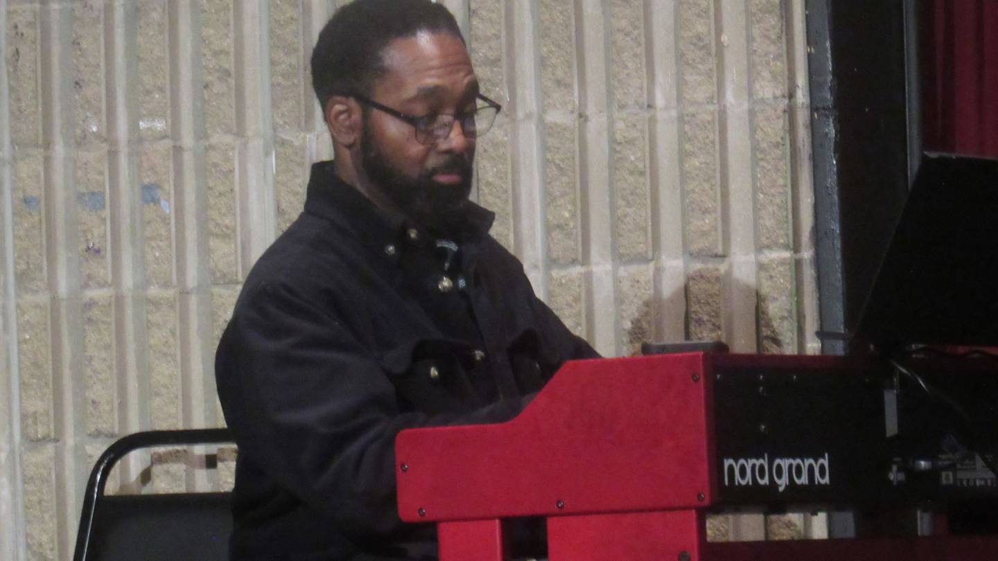 WL Weston of GSW Network will direct the production of “STAMP: A Story of Black America and U.S. Postage” on Saturday at the Billie Limacher Bicentennial Park and Theatre in Joliet. Weston is seen on Monday, Jan. 30, 2023, providing a musical interlude during rehearsals.