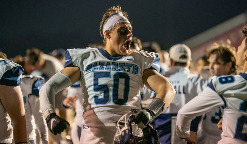 Nazareth Academy's William Beargie (50) celebrates after a state qualifying victory over Benet Academy at Benedictine University in Lisle on Friday, Oct 21, 2022.
