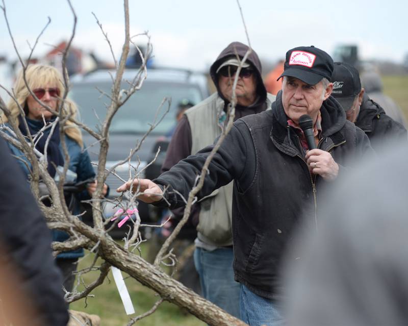 Auctioneer Mark Ebert of Polo takes a bid on trees at the Hazelhurst Spring Consignment Auction on Saturday, April 5, 2025.
