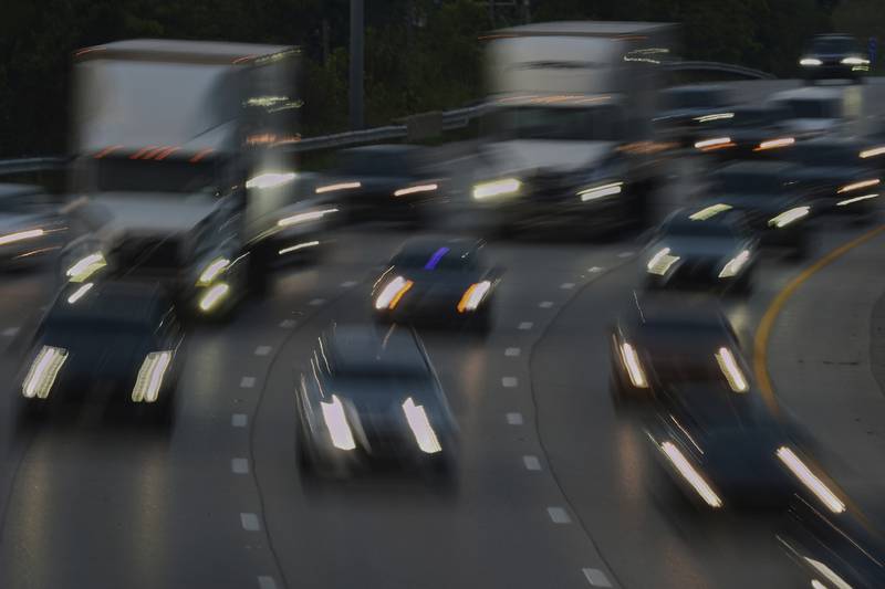FILE - Vehicles drive along a highway July 30, 2025, in Cincinnati. (AP Photo/Joshua A. Bickel, File)