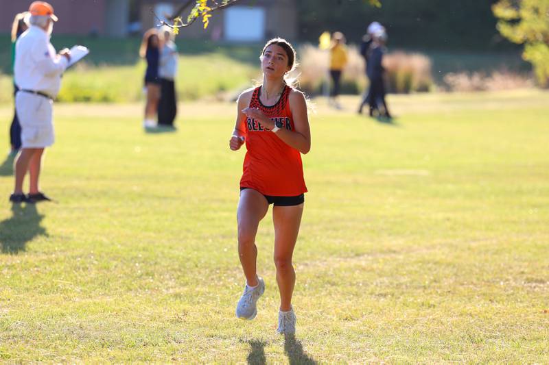Beecher's Madison Smith nears the finish line in the girls 3-mile race during All-Area Cross Country meet on Wednesday, Oct. 8, 2025, at Kankakee Community College.