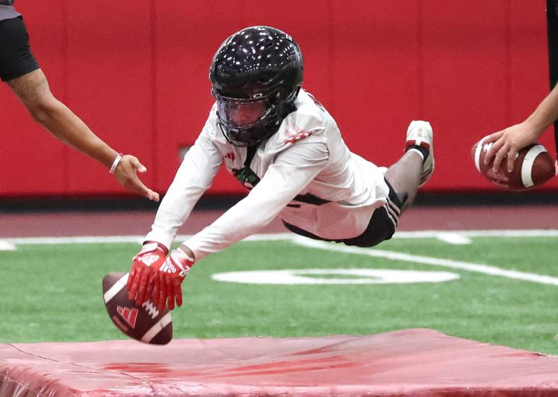 Northern Illinois University cornerback  	JaVaughn Byrd works on a kick blocking drill drill Wednesday, July 31, 2024, at practice in the Chessick Practice Center at NIU.