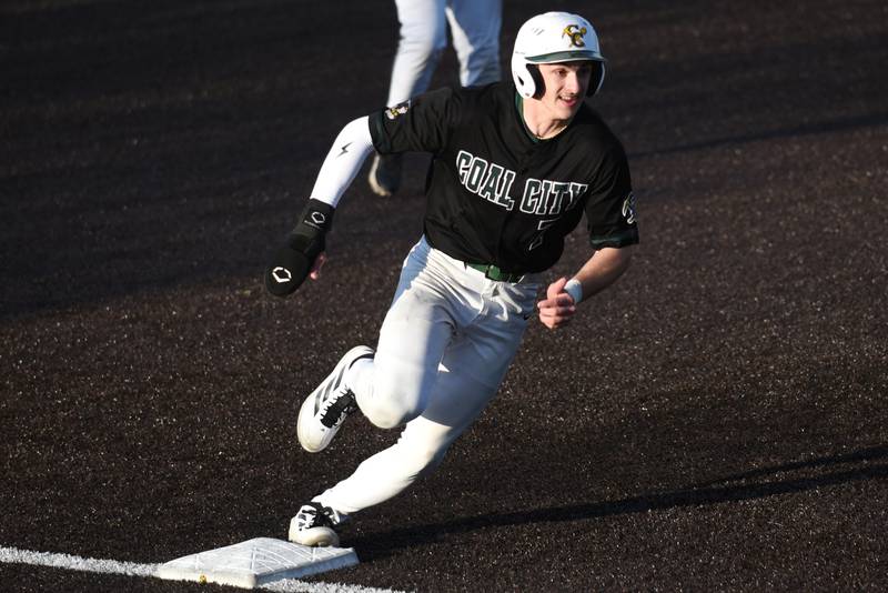 Coal City's Gavin Berger rounds third on his way in for a run during the Coalers' game at Herscher Monday, April 20, 2026.