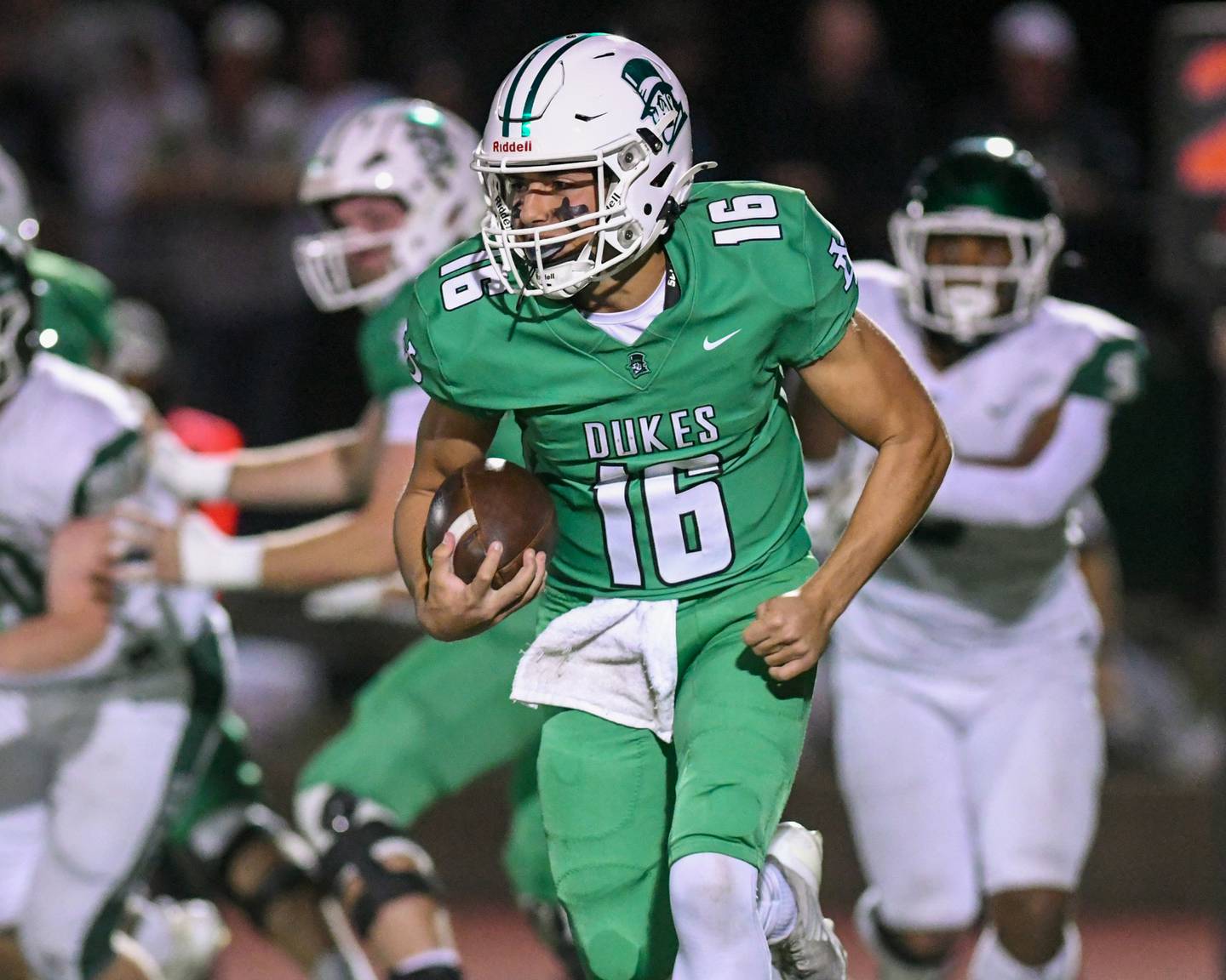York's Zack Assaad (16) runs the ball during the game on Friday Oct. 17, 2025, while taking on Glenbard West held at York High School.