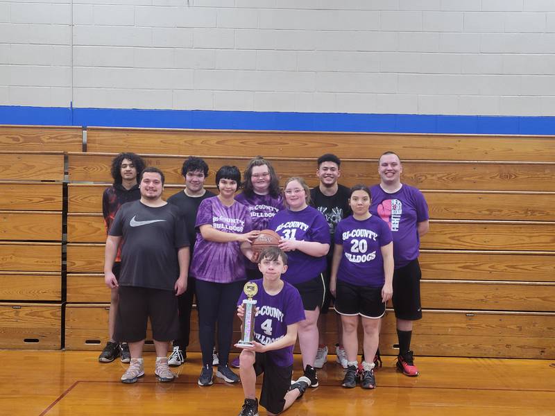 Members of the Bi-County Bulldogs are (back row, from left) Collin Mealing, Damian Hughes, Havannah Lee, J'Marion Hill, Kaleb Schipper; (middle row, from left) Angelo Heald, Samantha Zimmermann, Emily Hoffman, Samantha Merriman; and (front, holding trophy) 
Brenden Hoagland.