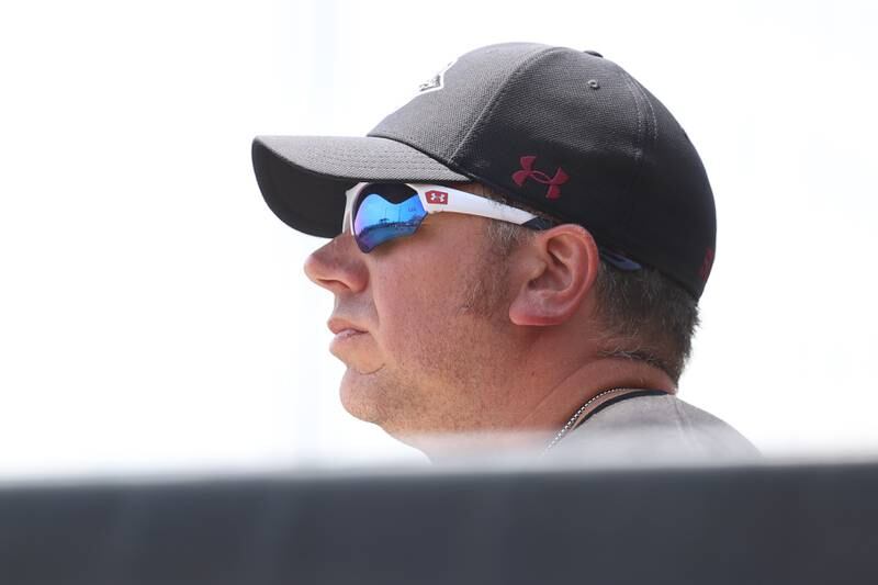 Antioch head coach Anthony Rocco stands in the dugout against Lemont in the Class 3A state championship game on Saturday, June 10, 2023 in Peoria.