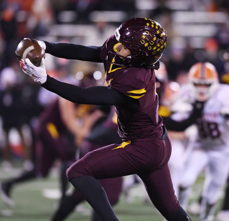 Montini's Nico Castaldo catches a pass during the IHSA Class 4A state championship game against Rochester on Friday, Nov. 28, 2025 in Normal.