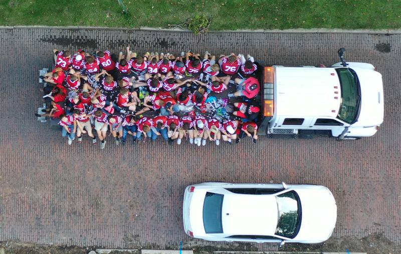 Members of the Hall football team ride on a float during the Hall High School Homecoming parade on Thursday, Sept. 28, 2023 in Spring Valley.