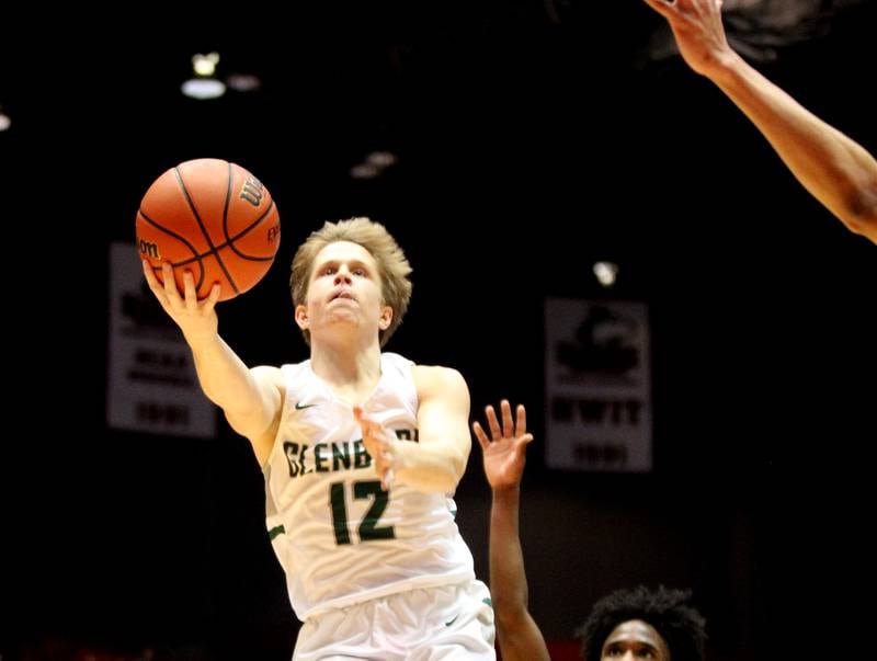 Glenbard West’s Andrew Dauksas gets the ball up during a Class 4A DeKalb Supersectional game against Larkin at the Northern Illinois University Convocation Center on Monday, March 7, 2022.