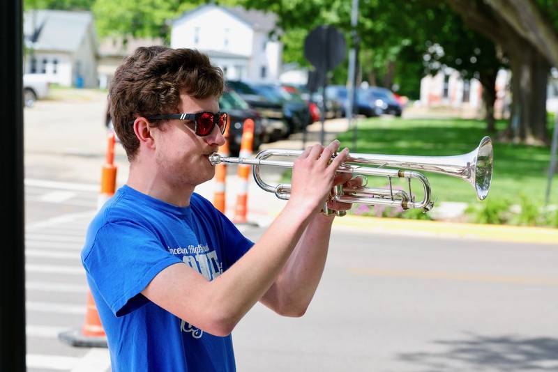 Timothy Batchelor of Princeton plays the Taps during Monday's Memorial Day Services in Princeton.