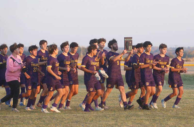 Members of the Mendota soccer team hold up the Class 1A Regional plaque after defeating Princeton on Tuesday, Oct. 22, 2024 at Serena High School. This is Mendota's sixth straight regional title.