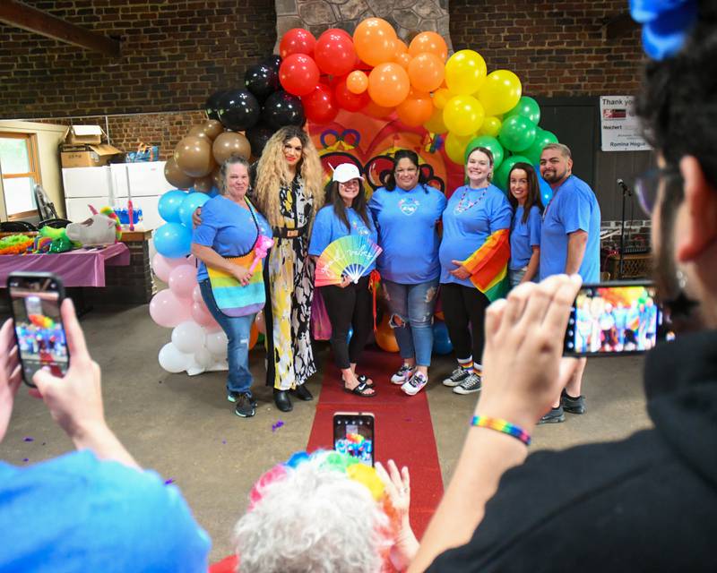 Members of the DeKalb Chamber of Commerce's Leadership Academy pose for a photo before the start of the inaugural Pride in the 815 event held at Hopkins Park in DeKalb on Saturday June 1, 2024. The academy group's class project was to host the event to kick off Pride Month festivities in DeKalb County.