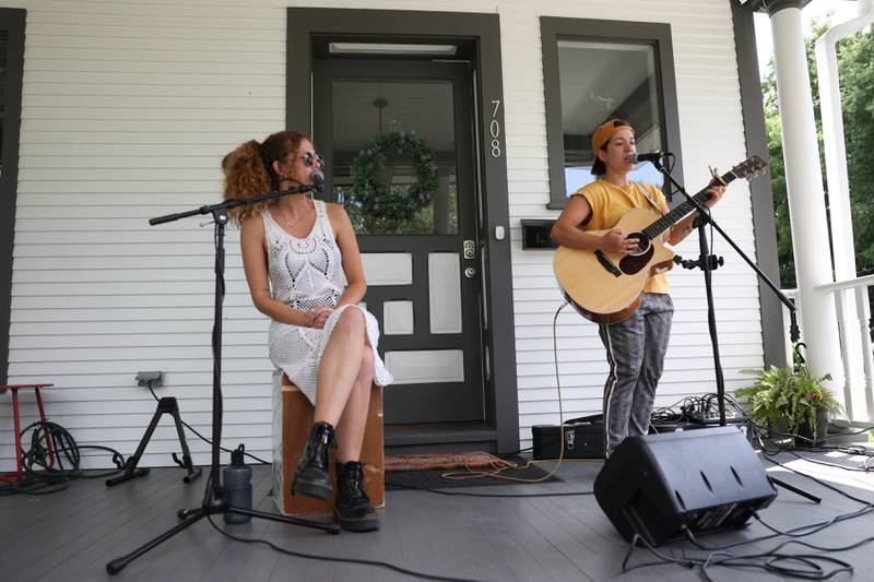 i.am.james, left, along with Lebo performs on a porch along Western Avenue. The Upper Bluff Historic District hosted Porch & Park Music Fest featuring a variety of musical artist at five different locations. Saturday, July 30, 2022 in Joliet.