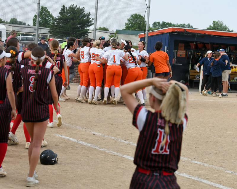 Oswego celebrates after taking the win over Yorkville on Tuesday June 3, 2025, during the sectional semifinal game held at Oswego High School.