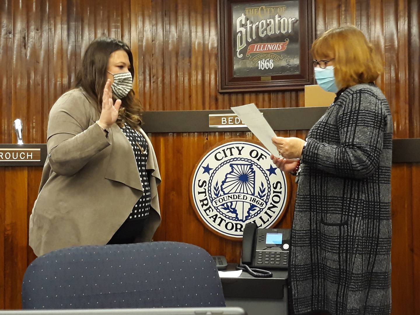 Streator Mayor Tara Bedei (left) is sworn-in Tuesday, Jan. 11, 2022, by City Clerk Patricia Henderson (right) in the council chambers of City Hall. Bedei is Streator's first female mayor.