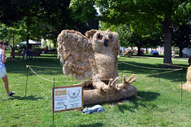 "Peek A Boo," by Steve Lentz, of Montello, Wisconsin, on Saturday, Aug. 24, 2024, sits on the Mt. Morris College Campus in the village's downtown. The straw sculpture was an entry in the ninth annual U.S. National Straw Sculpting Competition and won first place for Artists' Choice and third place for People's Choice.