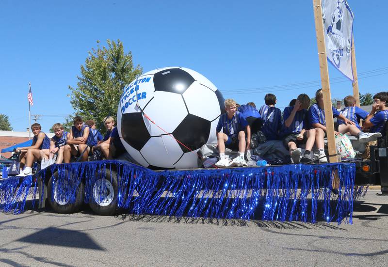 Members of the Princeton High School boys soccer team ride a float during the 52nd annual Homestead Festival parade on Saturday, Sept. 9, 2023 in Princeton.