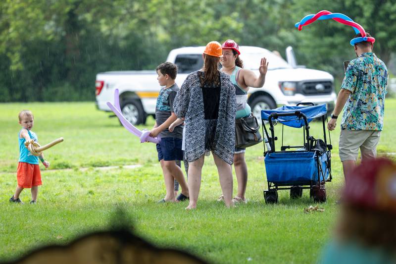 Families attend the Touch a Truck event on Sunday, July 27, 2025, at Riverfront Park in Ottawa.