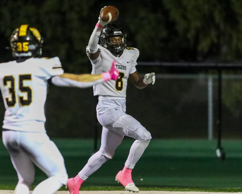 Joliet West's Micah Mcnair (8) celebrates a pick six during football game between Joliet West at Plainfield Central.   Oct 20, 2023.