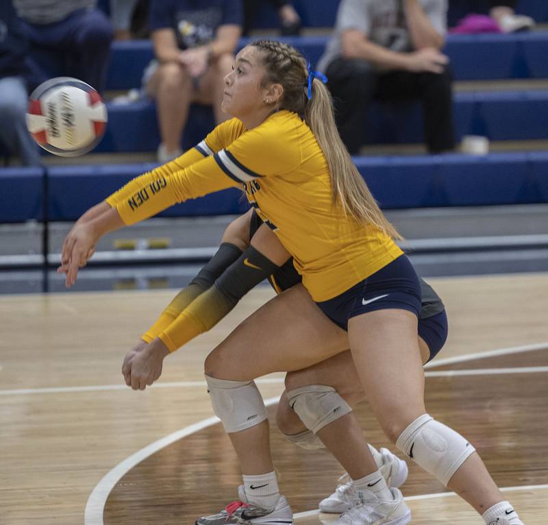Sterling’s Chloe Clemens (left) and Mya Lira play the ball against Alleman Thursday, Sept. 25, 2025.