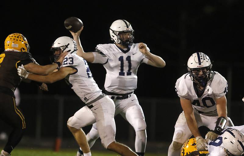 Cary-Grove's Jackson Berndt throws a pass during a Fox Valley Conference football game against Jacobs on Friday, Oct. 24, 2025, at Jacobs High School in Algonquin.