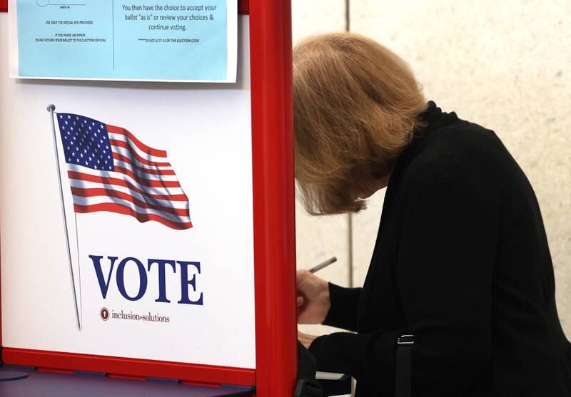 Linda Walker of Sycamore votes Thursday, Sept. 26, 2024, during the first day of early voting for the November election at the DeKalb County Legislative Center in Sycamore.