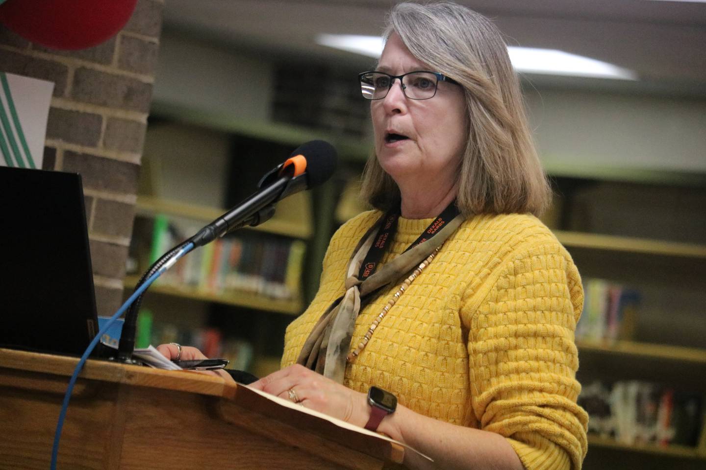 Cindy Carpenter, the district's director of business and finance, speaks Feb. 21, 2023 at the DeKalb District 428 school board meeting.