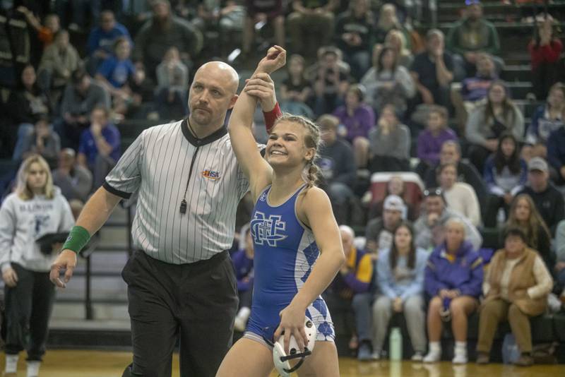 Blair Grennan of Newman Central High School takes the victory in the 100 weight class during girls wrestling sectionals at Geneseo on February 10, 2024.