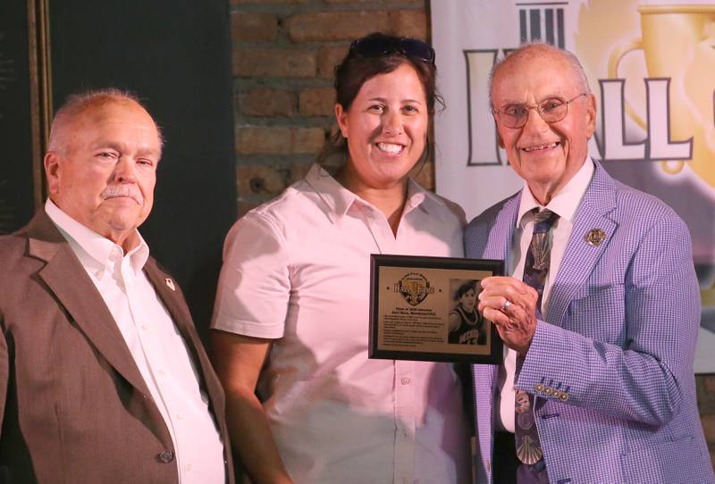 Mendota/IVCC alumna and basketball star Jaci Bice, poses with Rick Sipovic and Lanny Slevin during the 2025 Shaw Media Illinois Valley Sports Hall of Fame at the Auditorium Ballroom in La Salle.