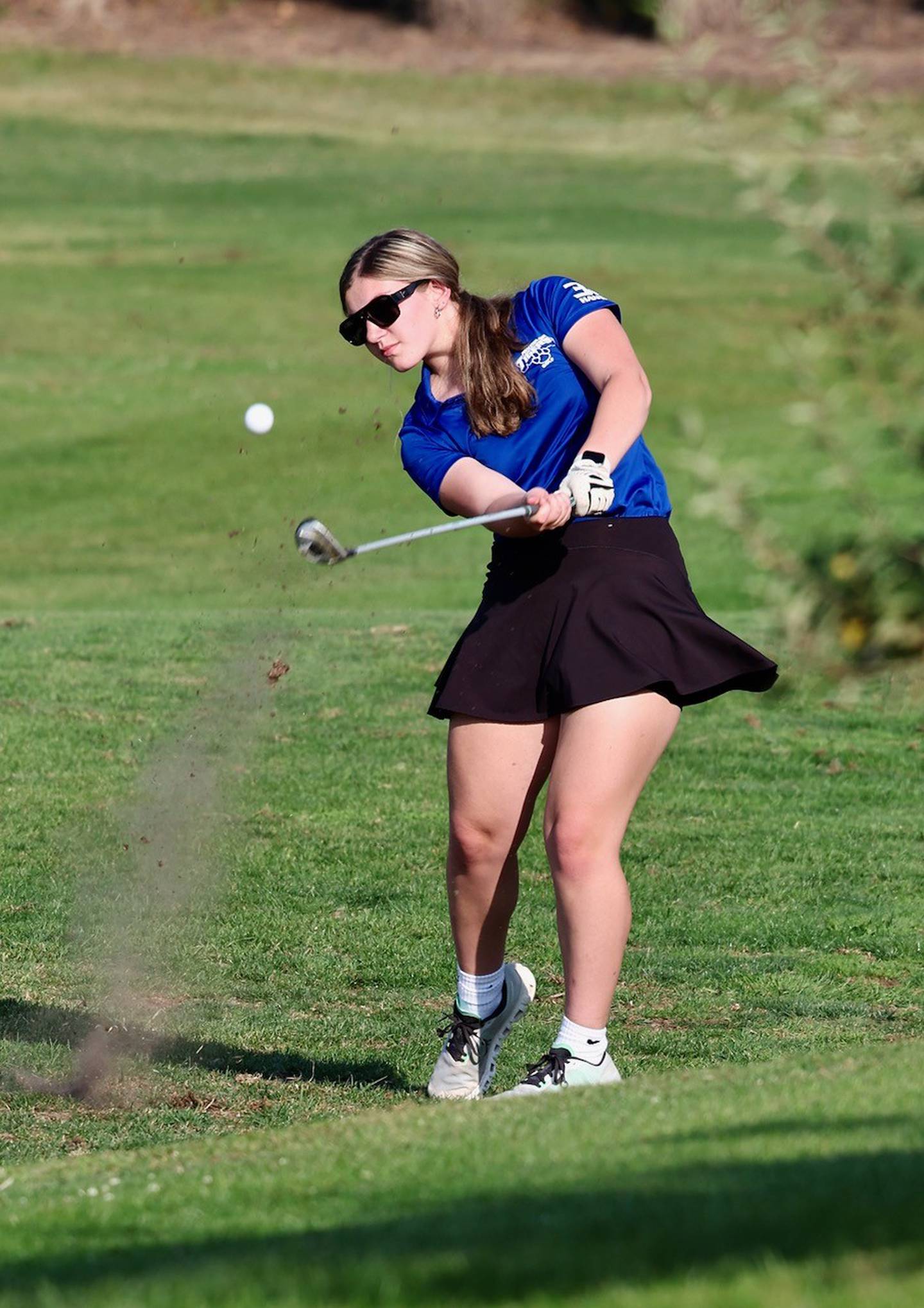 Princeton senior Anika Hansen takes a swing in Wednesday's match at Wyaton Hills Golf Course.
